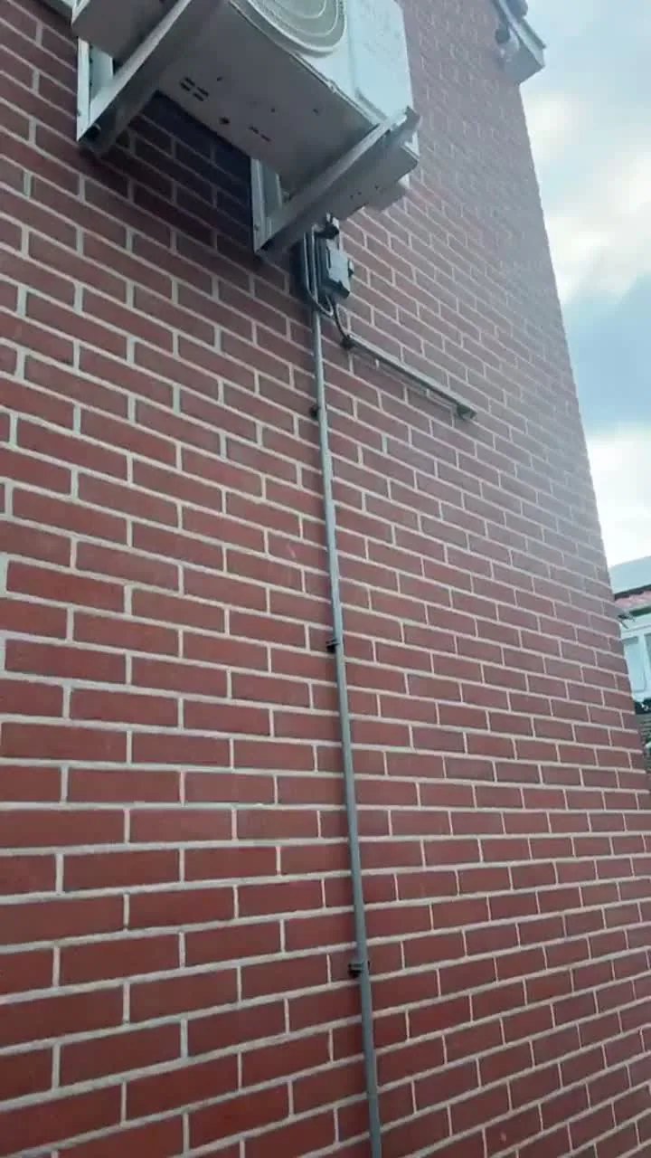Video van een afgewerkte airco-installatie aan een gevel